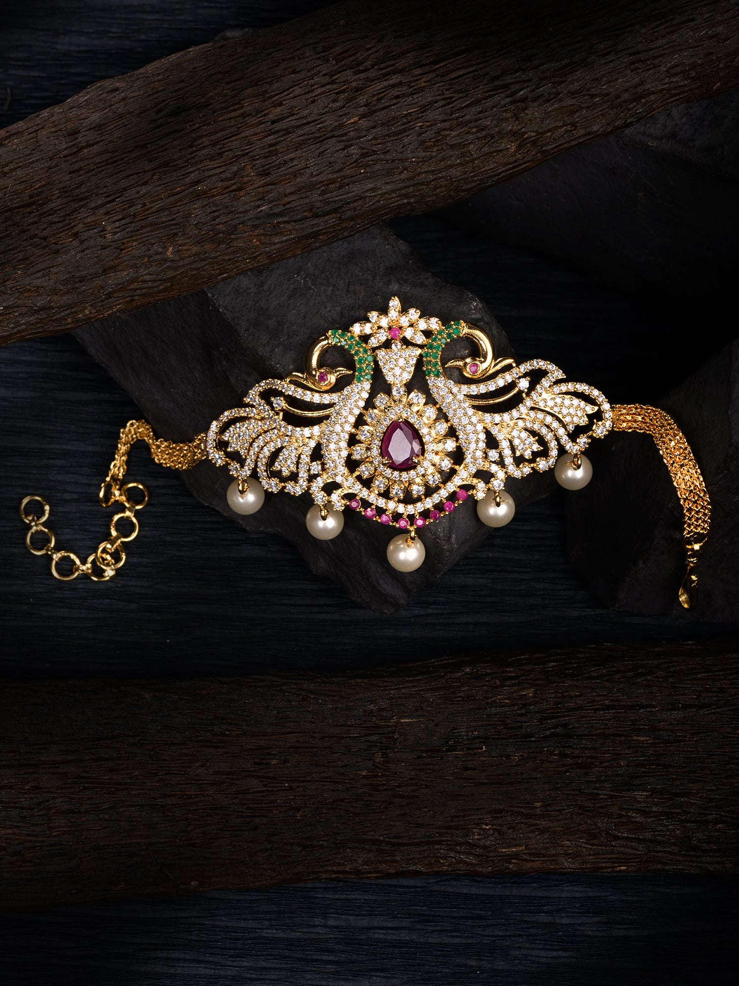 Gold Plated Red AD Studded Peacock Temple Armlet