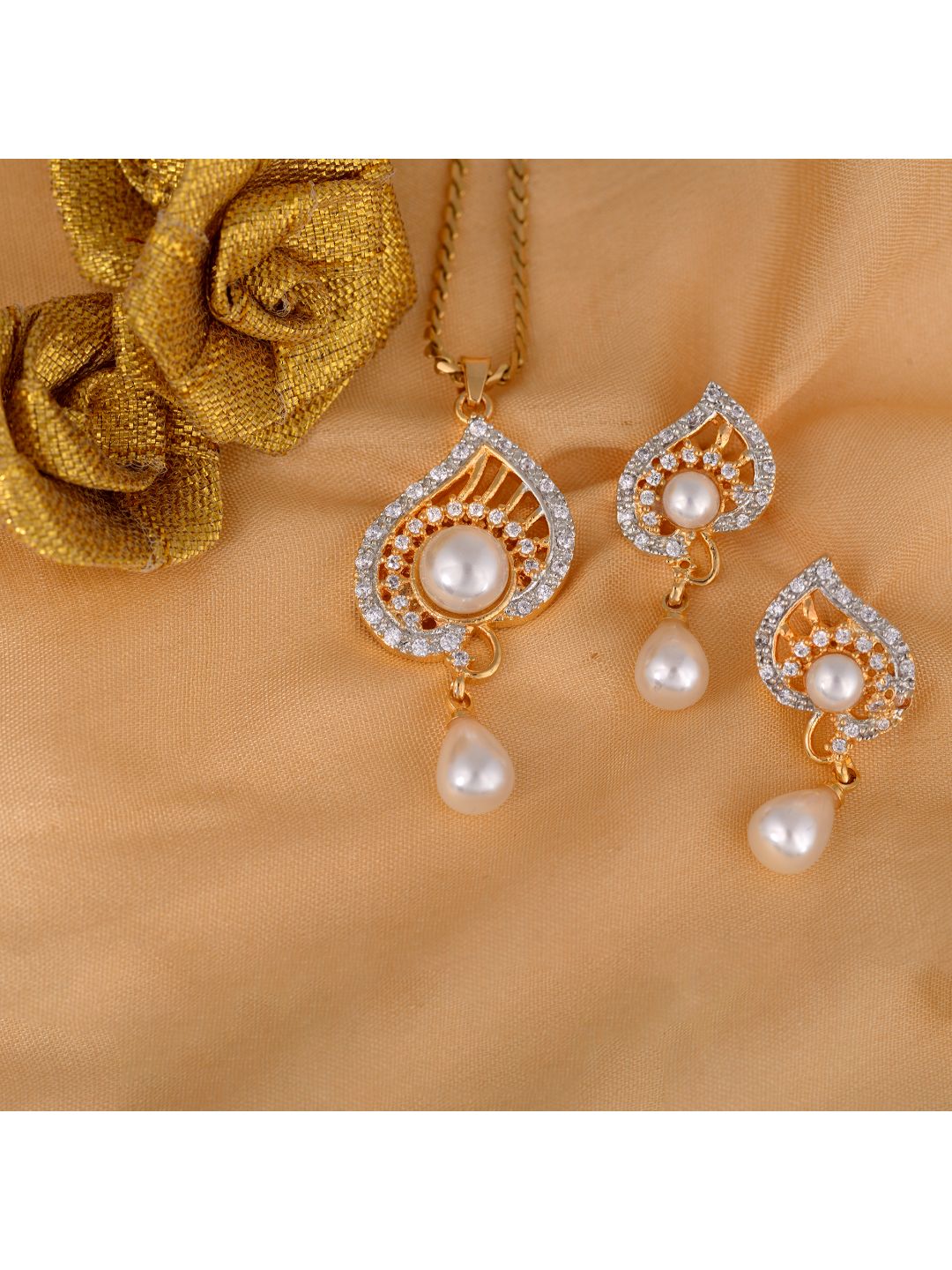 Gold plated AD and Pearl studded Unique leaf design Pendant Earrings set chain for Women & Girls