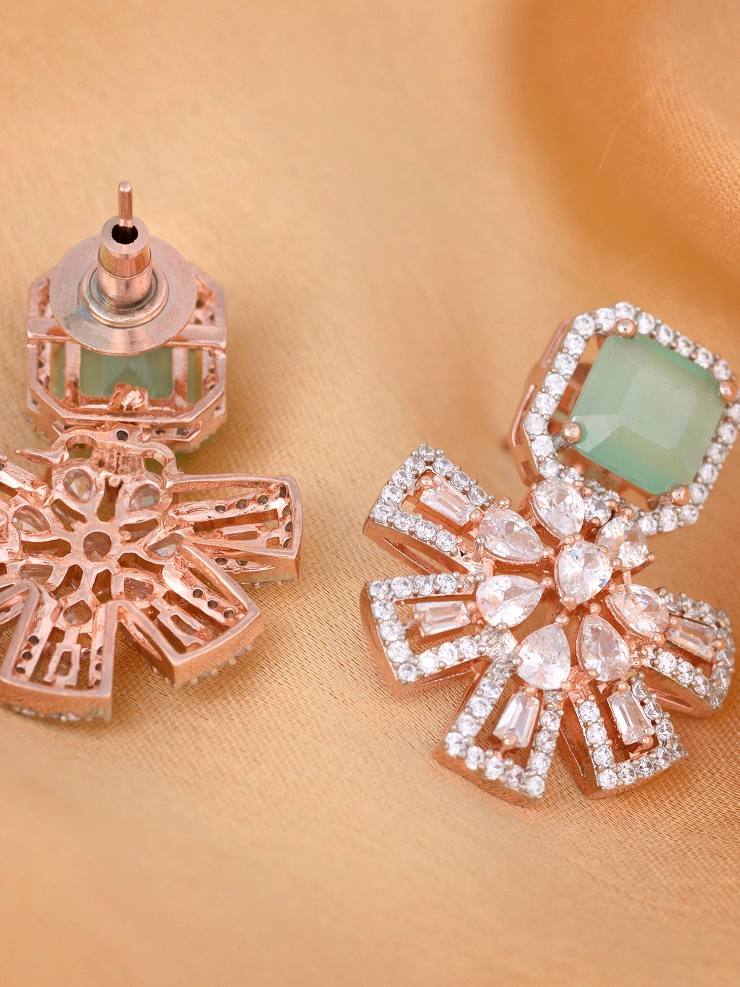 Exquisite Turquoise Floral design pastel blue earrings Rose gold plated AD studded