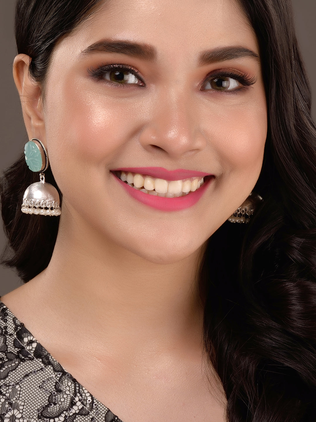 Silver Toned Turquoise Stone Studded Jhumka Earrings