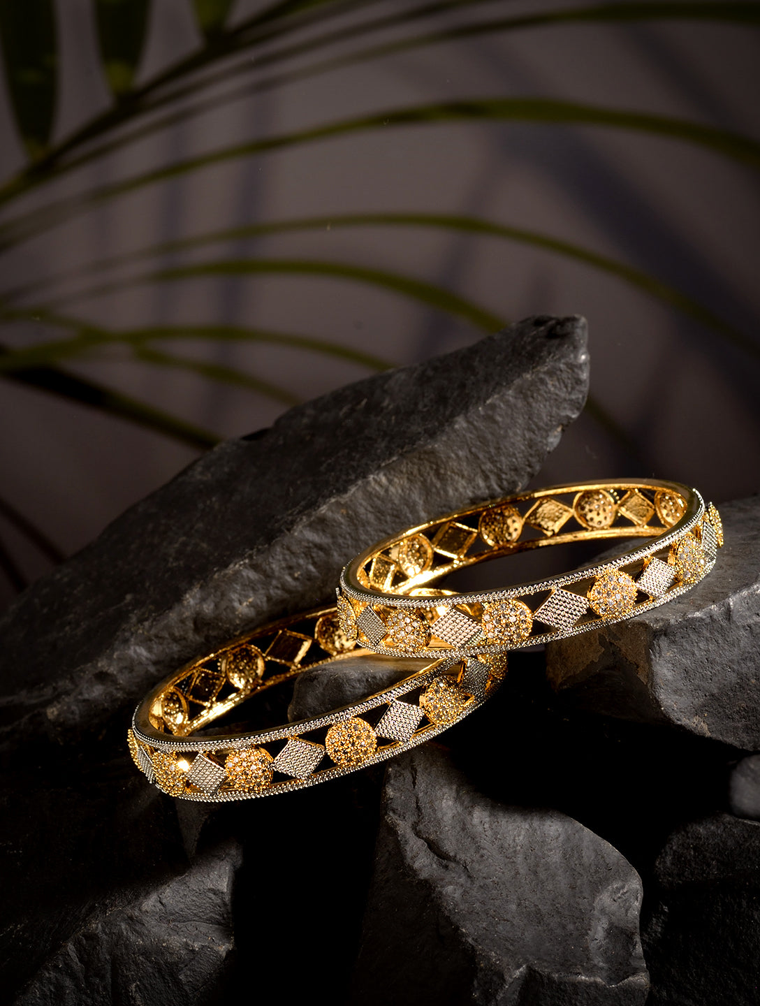 A Pair of 2 Gold Toned Intricate design Bangle Bracelet