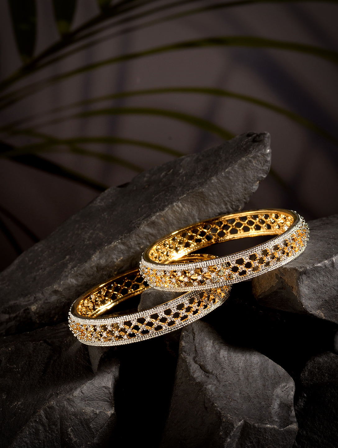 A pair of 2 Gold Dual  Toned AD Studded hand Crafted  Textuerd Bangles