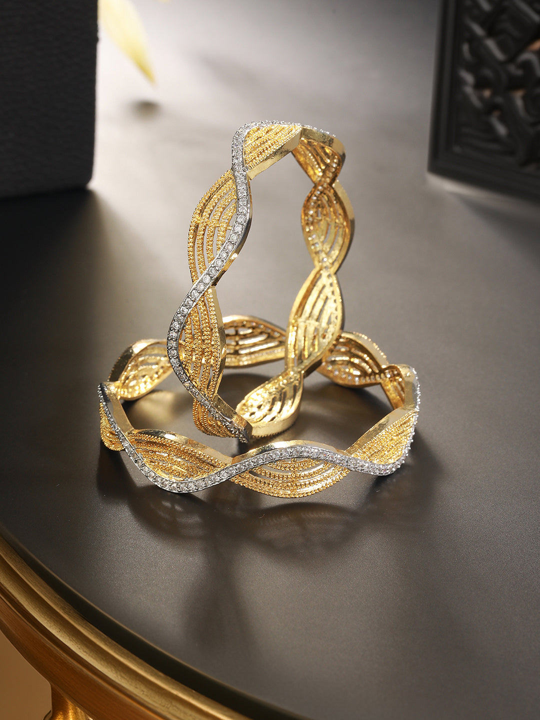 A Pair Of 2 Gold Dual  Toned AD Studded hand Crafted Bangles