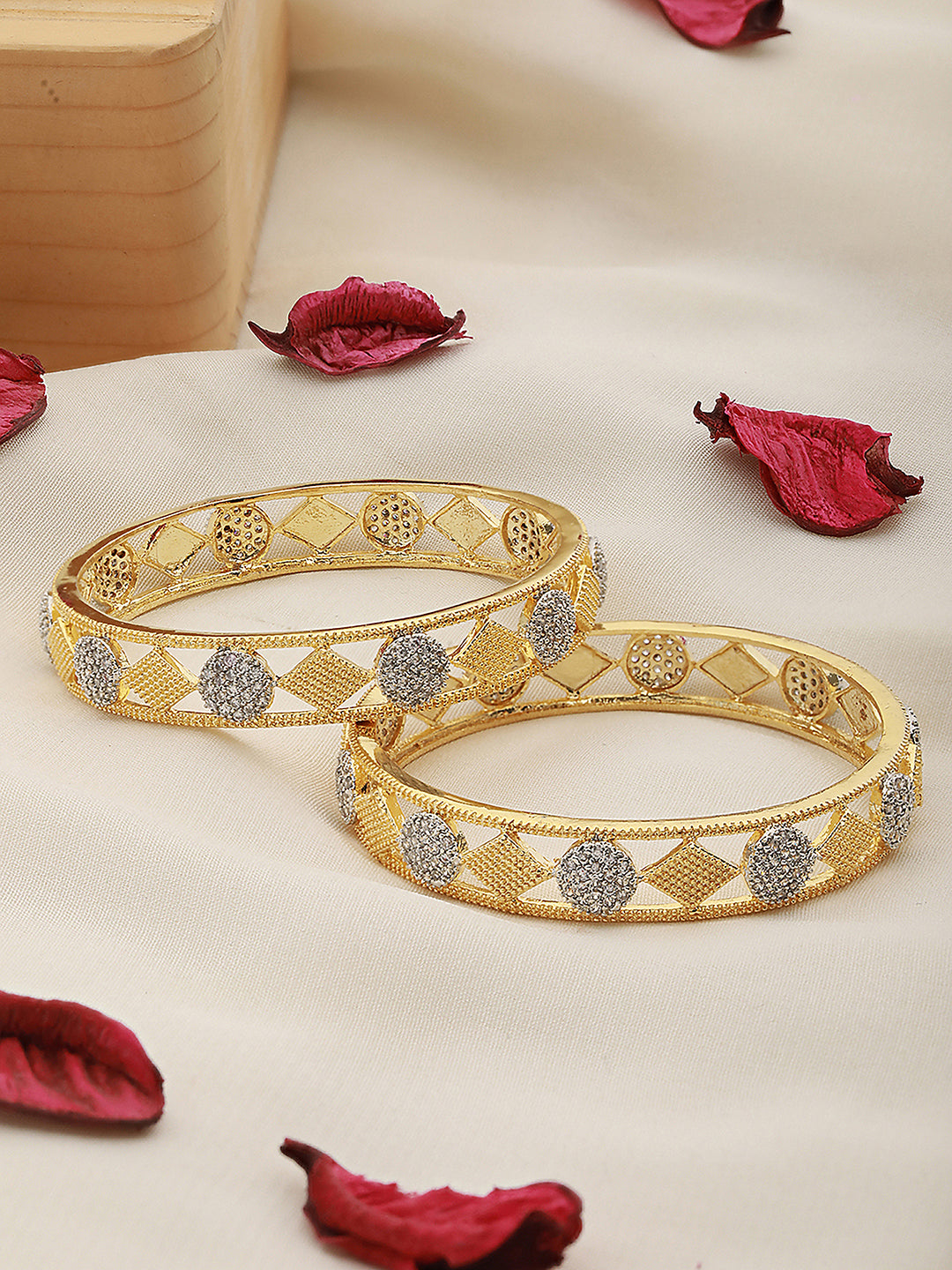 A Pair of 2 Gold Toned Intricate design Bangle Bracelet