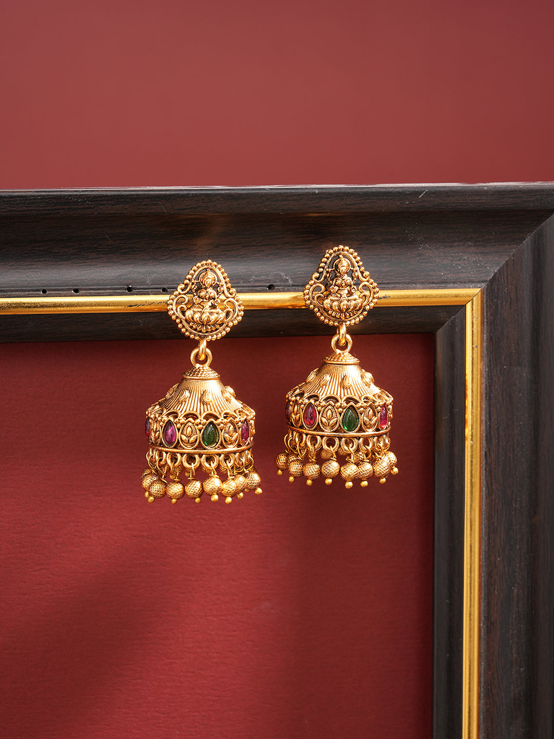 Antique gold ruby green stone temple jhumka earrings