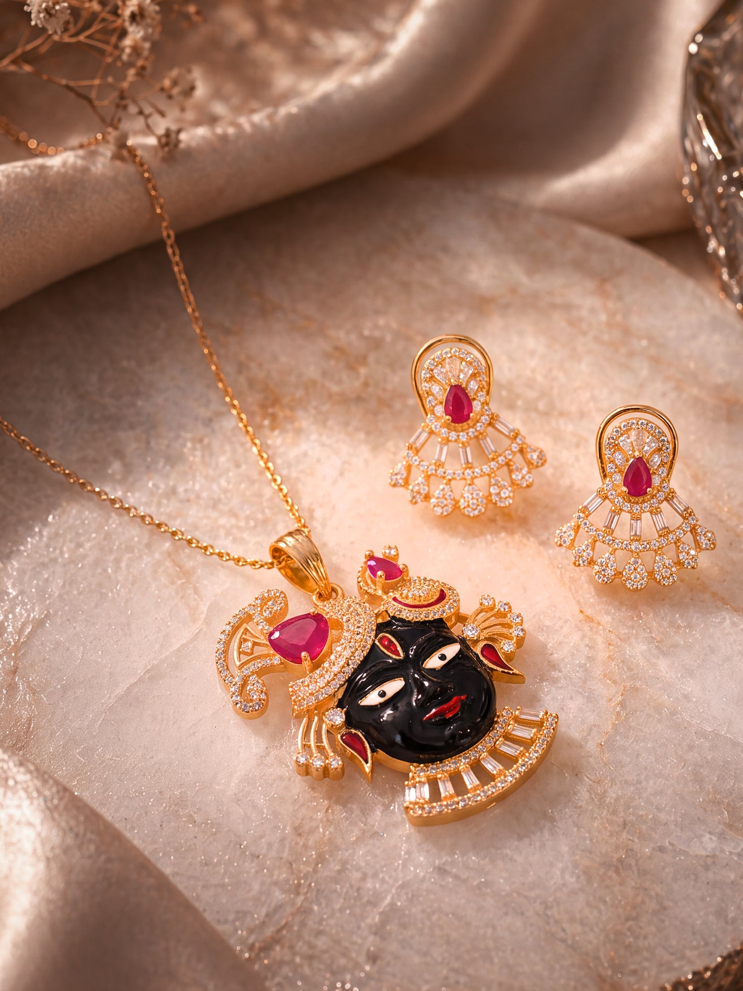 Gold plated ruby pink AD Shrinathji temple pendant jewellery set