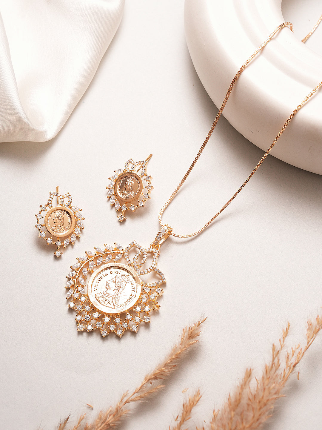 Rose gold plated AD round coin sunburst pendant set
