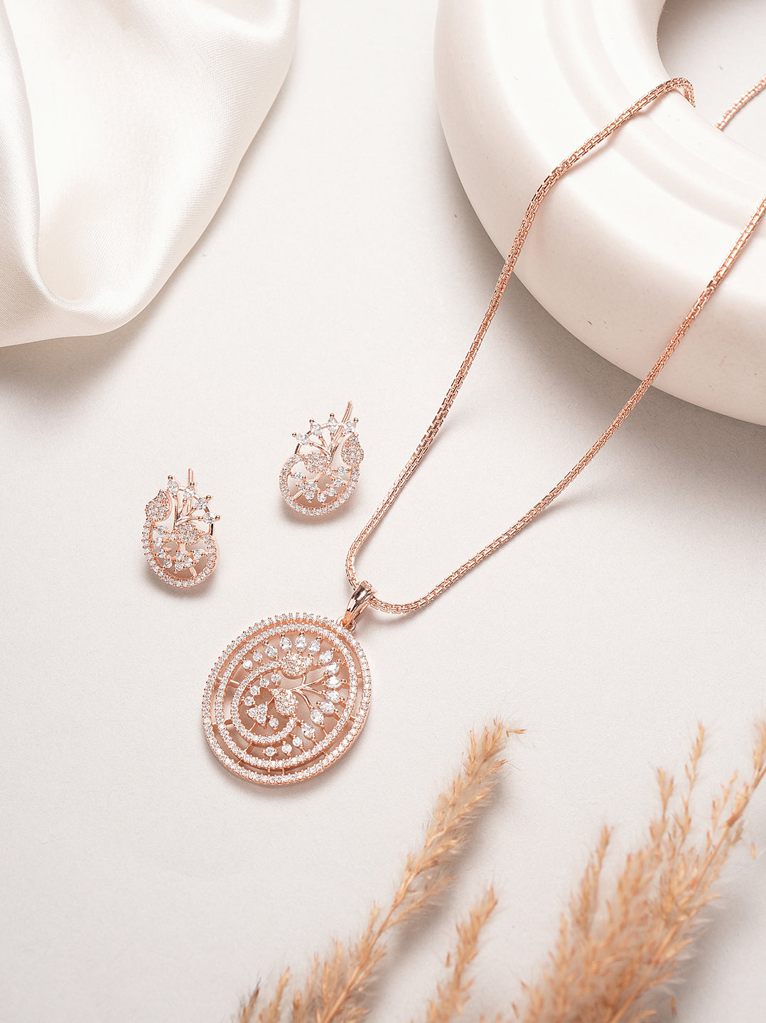 Rose gold plated AD round swirl pendant set