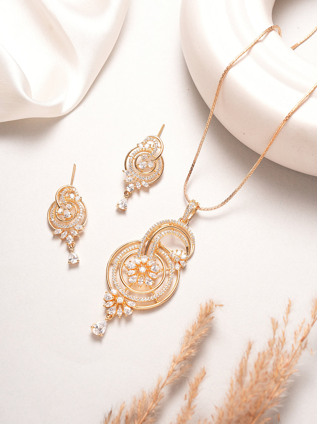 Rose gold plated AD swirl paisley drop pendant set