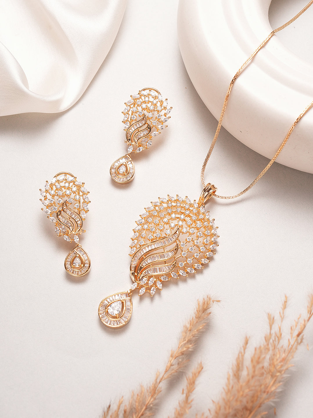 Rose gold plated AD peacock feather pendant set