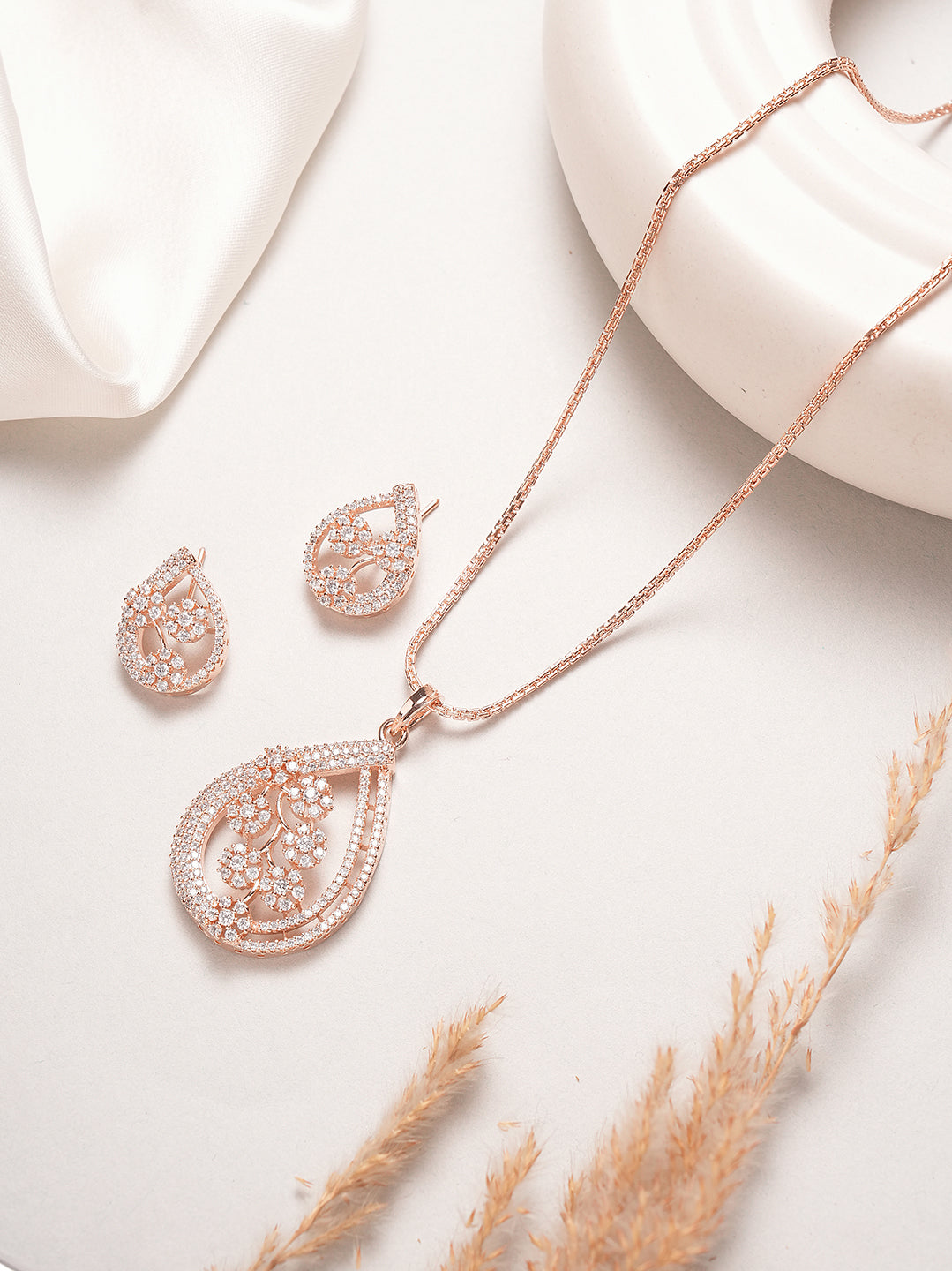 Rose gold plated AD floral teardrop pendant set
