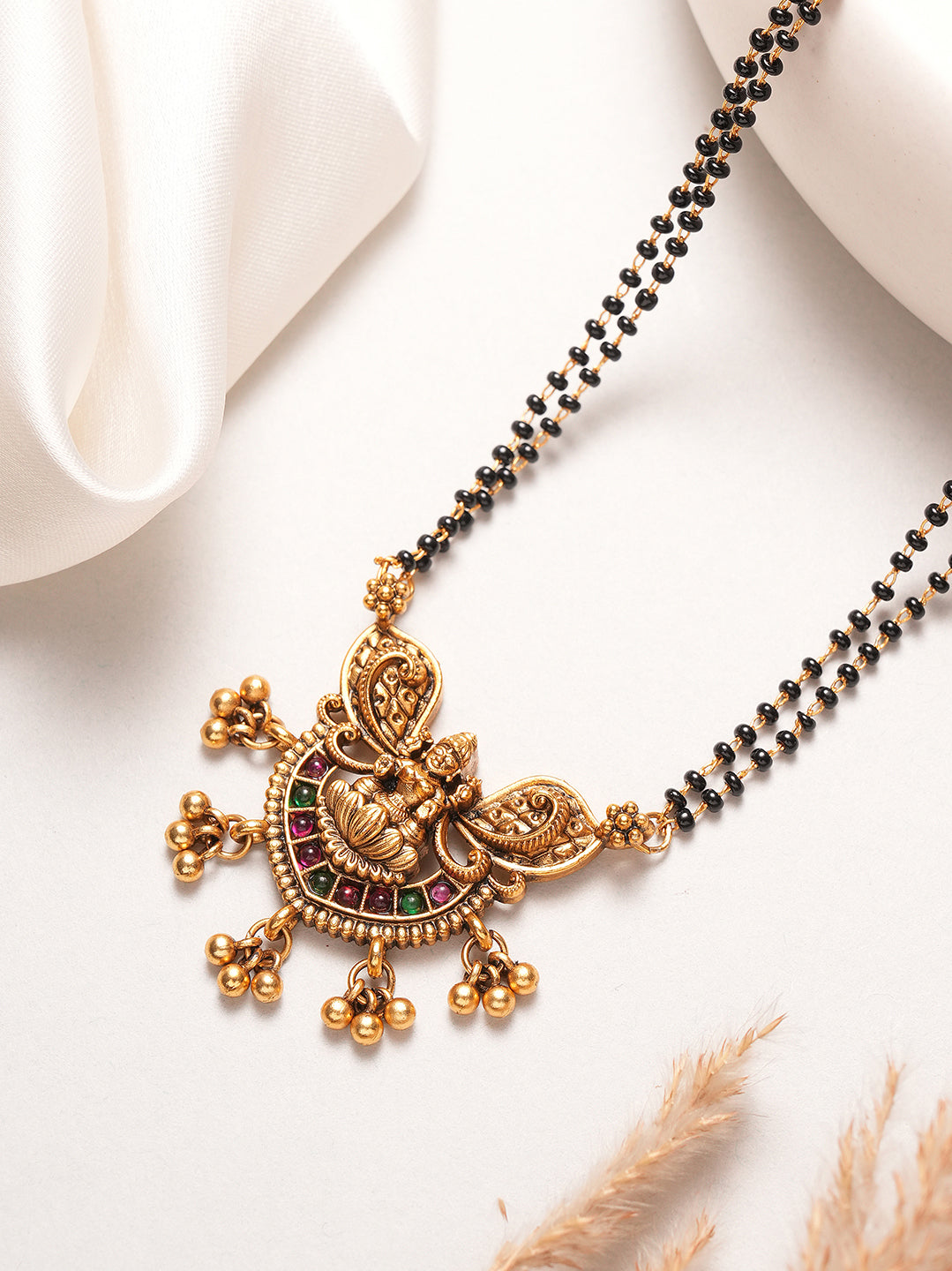 Gold plated peacock pendant black beaded mangalsutra