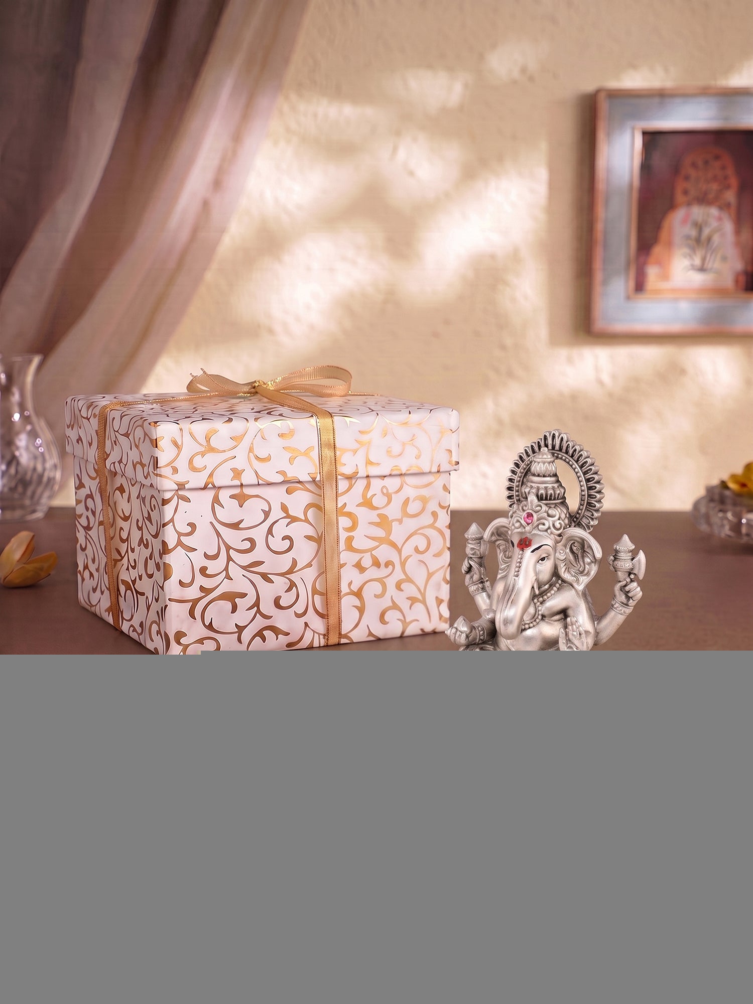 Saraf RS Lord Ganesha Idol on Carved Base (999 Silver Plated)