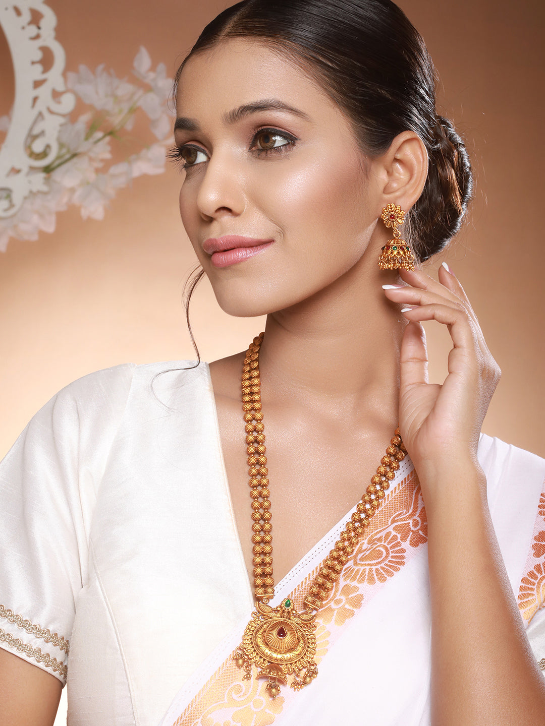 Antique Gold Toned Green Stone Studded Haram Chain Pendant Jewellery Set