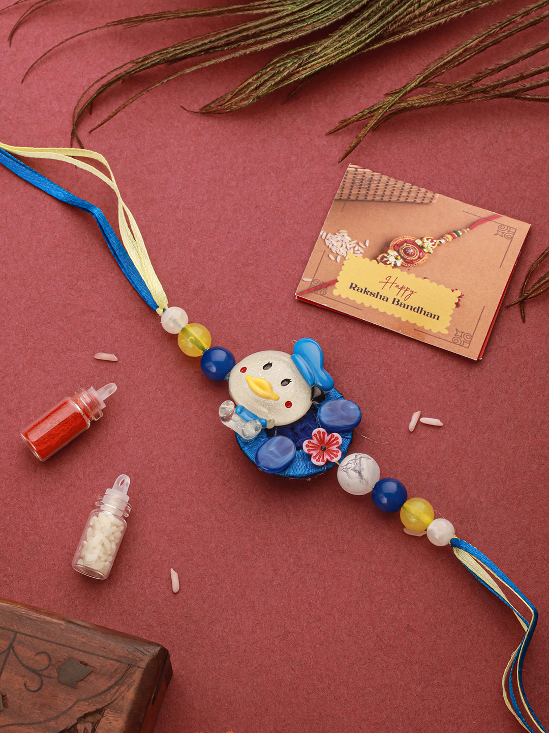 Blue Donald Duck Toy Ribbon Handcrafted Rakhi for Boys Or Girls with Roli Chawal