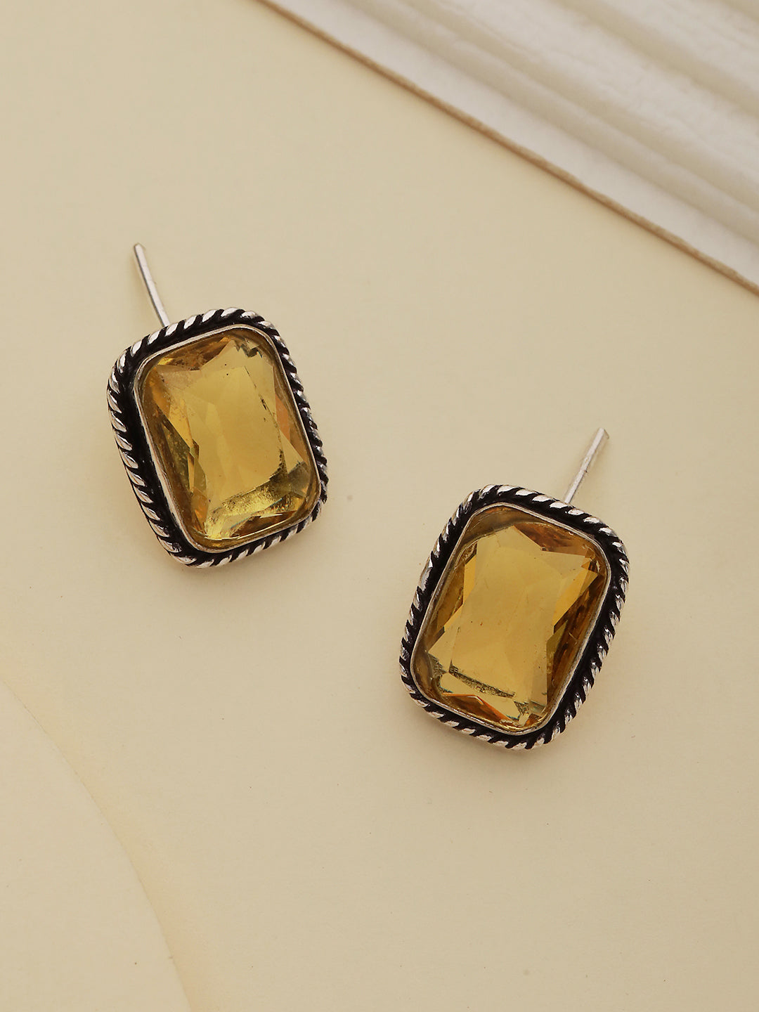 Yellow stone studded Studd Earrings