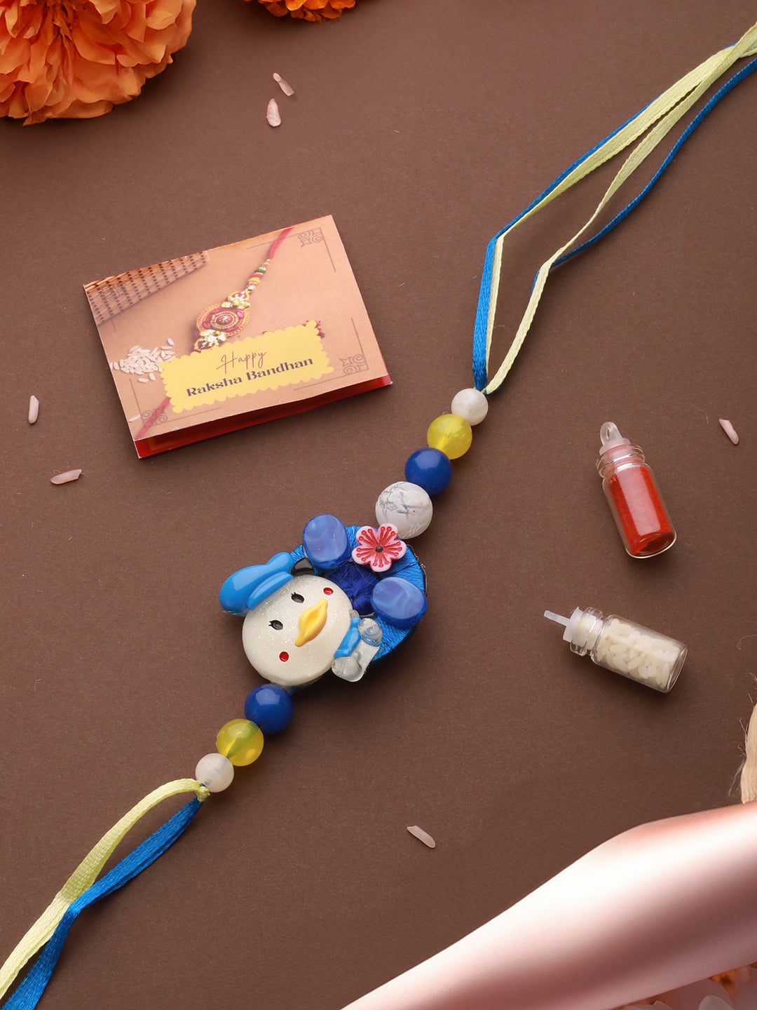 Blue Donald Duck Toy Ribbon Handcrafted Rakhi for Boys Or Girls with Roli Chawal