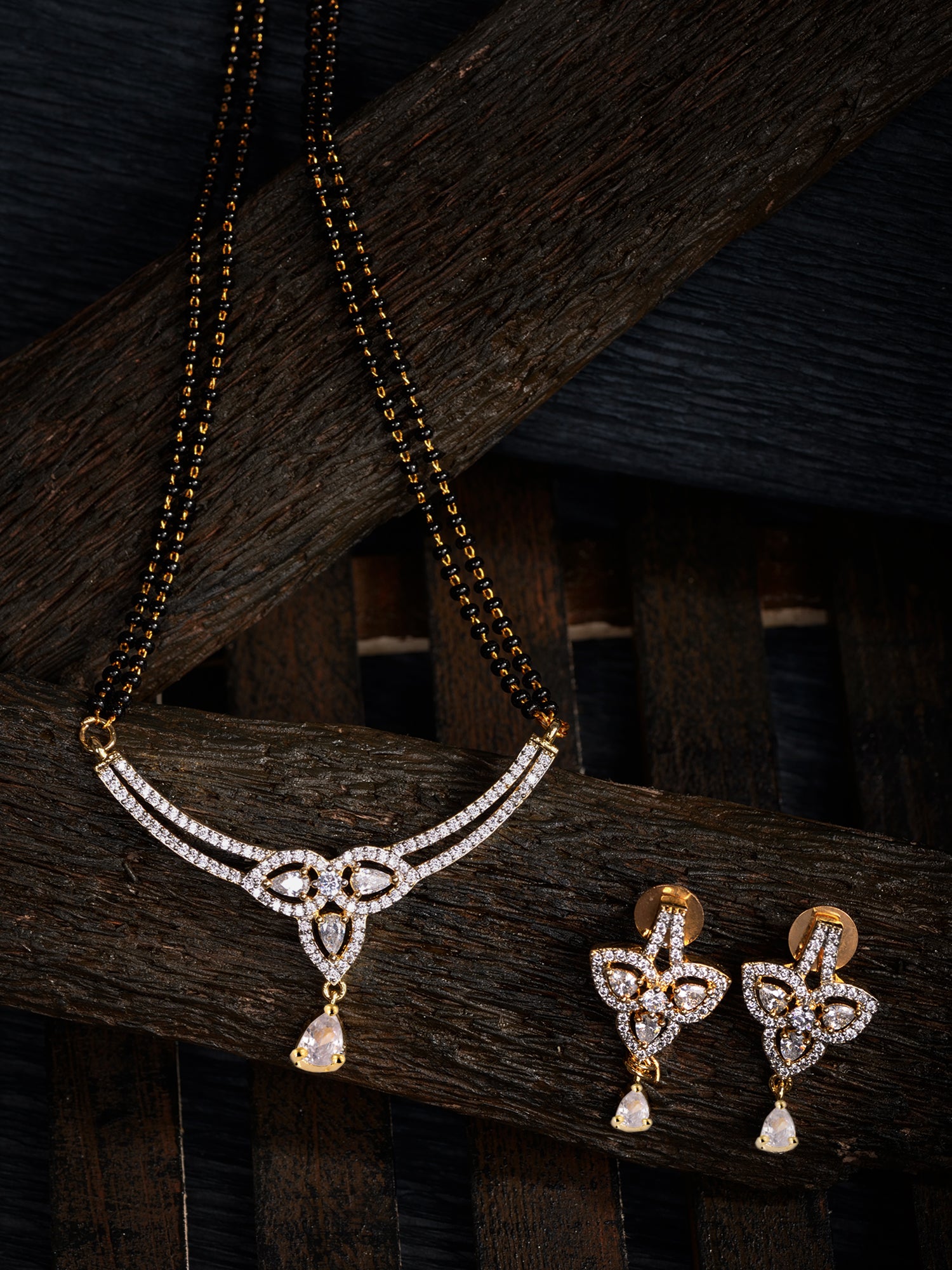 Gold Plated Black & White AD Studded & Beaded Mangalsutra Earrings