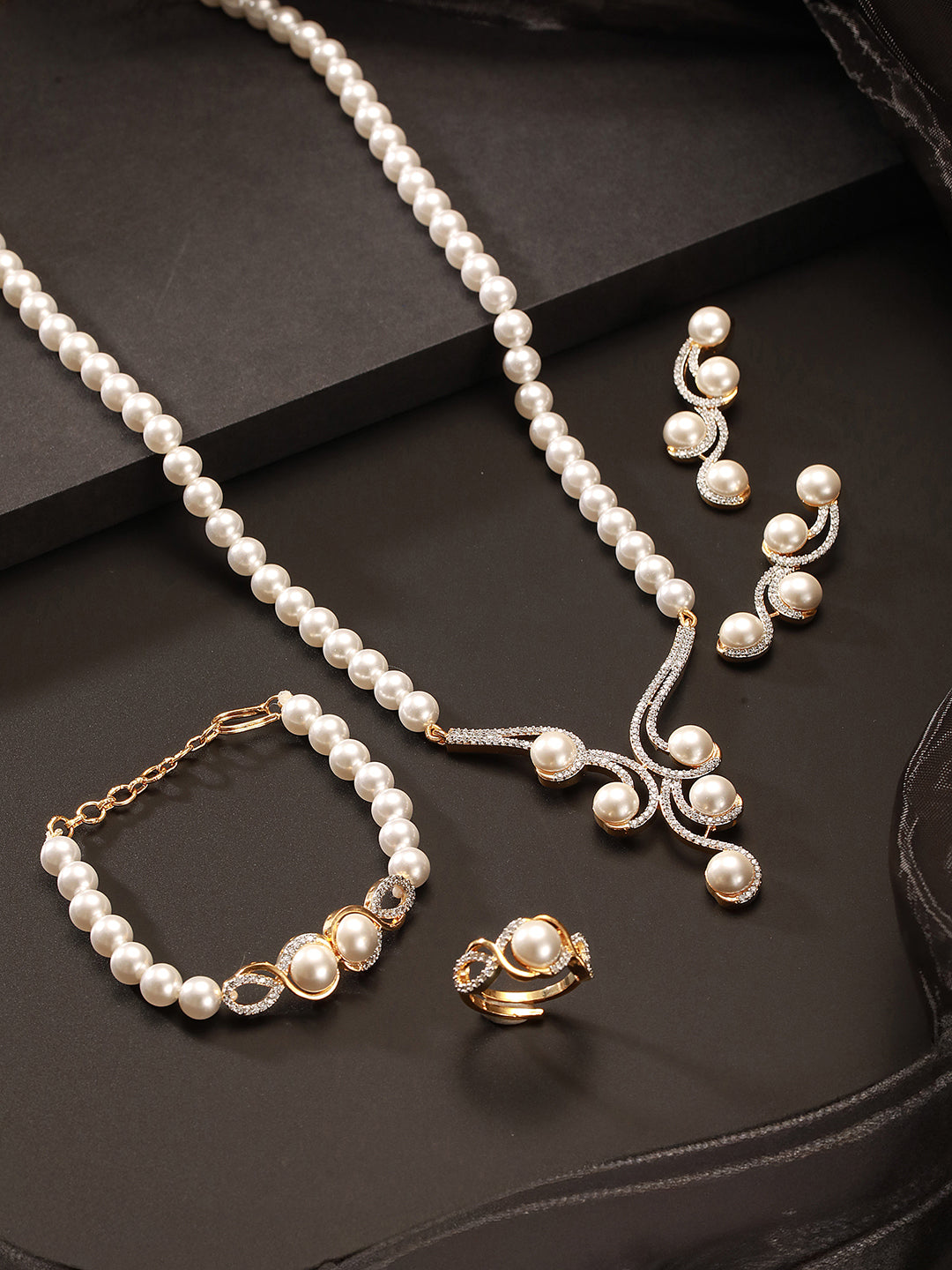 Combo Gold Plated White AD & Pearl Studded Floral Minial Ring, Bracelet With Earrings Jewellery Set