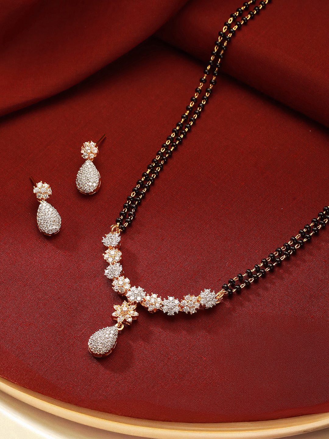 Gold Toned AD Studded Black Beads Studded  Designer Solitaire Type Mangalsutra Jewellery Set