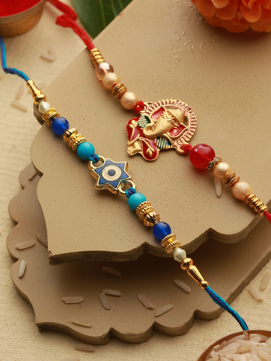 Set Of 2 Evil eye nd Ganesha Rakhi with Roli Chawal