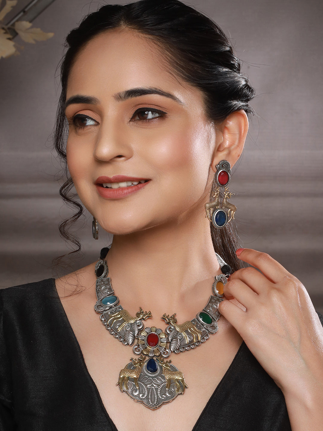 Dual Toned  Oxidised  Red Stone Studded Brass Handcrafted Deer Motif Intricate Designer Jewellery Set