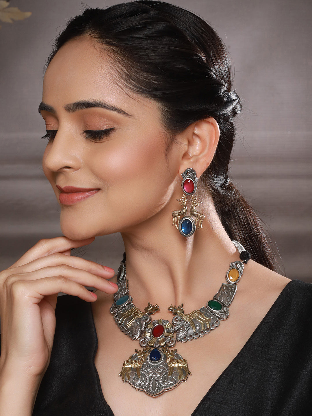 Dual Toned  Oxidised  Red Stone Studded Brass Handcrafted Deer Motif Intricate Designer Jewellery Set
